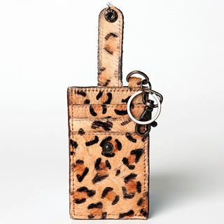 The American Darling Leopard Card Holder keychain features a strap, two key rings, and a button snap closure. Designed to securely hold cards, its bold and vibrant animal print adds a stylish touch perfect for any fashionista's purse, all set against a plain white background.