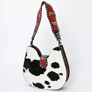 Cow Hide Handbag with red floral print on strap and buckle - leather material