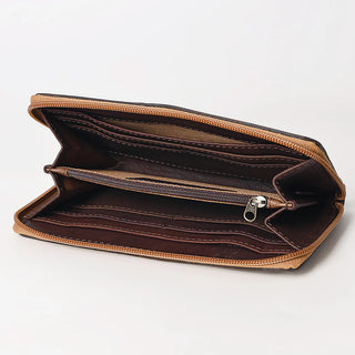 The Percie Cowhide Tooled Wallet by American Darling is displayed open with its compartments visible. This brown leather wallet showcases a central zippered pocket and numerous slots for cards and cash, all intricately tooled. The tan-colored zipper and stitching add to its refined look against the plain white background.