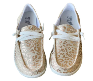 Introducing the Leopard Sneakers in Rose Gold by Western Edge Boutique, a stylish pair of slip-on sneakers with white soles. These shoes are crafted from canvas material and showcase an eye-catching shiny leopard print design. Additionally, they feature white laces tied in elegant bows at the top.