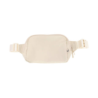 The Large C.C Fanny Pack by C.C Beanie is perfect for hands-free travel. This beige waist bag features a main zippered compartment and an adjustable belt with a side-release buckle. Its minimalist design showcases a small brand tag near the zipper, making it ideal for carrying your on-the-go essentials effortlessly.