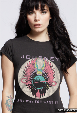 A person with long dark hair is wearing a Recycled Karma Journey Any Way You Want It Only the Young Baby Graphic Tee in vintage black, featuring the "ANY WAY YOU WANT IT" text on the front. The 100% soft cotton t-shirt pairs perfectly with their colorful tattoo on the right forearm, completing a rocker-inspired look. The style number "#302777" is visible in the bottom right corner.