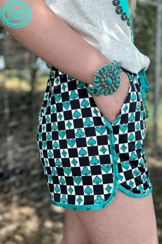 black, white turquoise checkered shorts, turquoise hem lining 