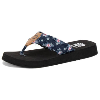 The FIREWORK Women Star Denim Strap Thong Flip Flops by Mars Sky Shoes Wholesale feature a single black flip-flop sandal with a thick fabric strap adorned with stars and an American flag pattern. With its flat sole and detailed stitching on the strap, it's perfect for showing off your patriotic style.