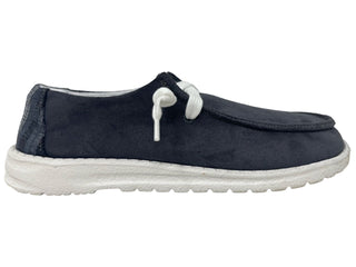 The Poppy Grey Slip-On Sneaker by Gypsy Jazz is a casual moccasin-style shoe featuring a dark blue shade, white sole, and white laces. The shoe boasts a low-cut design with a cushioned footbed and a soft, suede-like texture for a relaxed and comfortable appearance.