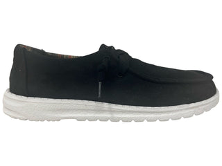 Introducing the Moxie Black Slip-On Sneaker by Gypsy Jazz: This chic casual shoe features a black fabric upper and a white sole. It sports an easy slip-on design with two elastic eyelets and a slightly padded collared edge for added comfort. The cushioned footbed ensures ultimate comfort, while the textured pattern on the sole provides excellent grip.