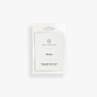 The minimalist white packaging of Hico Candle Co.'s "Wax Melts 540 Rouge, Coffee House, Man Wax Melt" embodies modern masculinity. The package bears the text "Hand Poured Small Batch Wax Melt - 2.8 oz/79 g" on the front and is displayed against a light grey background, evoking the essence of luxury fragrance akin to Baccarat Rouge.
