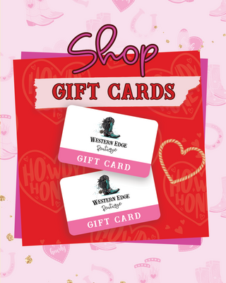 A promotional image features two captivating E-Gift Cards from Western Edge Boutique against a vivid red background with heart and cowboy hat designs, topped with stylish fashion-themed "Shop Gift Cards" text.