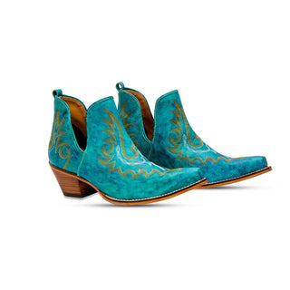 Introducing the Westerlee Turquoise Leather Booties by Western Edge Boutique, these mid-heel, ankle-high western booties boast intricate yellow stitching patterns. With pointed toes and wooden heels, their vibrant turquoise color delivers a stylish and unique appearance.