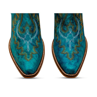 The Westerlee Turquoise Leather Booties from Western Edge Boutique are a stunning pair of cowboy booties that showcase intricate yellow and blue embroidery patterns on the front. Crafted from soft leather, these boots feature brown soles accented with visible white stitching around the edges. They are displayed in a top view.